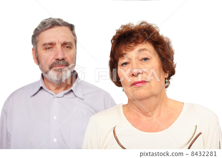 Portrait of senior couple, focus on woman, isolated Portrait of senior couple, focus on woman, isolated 8432281