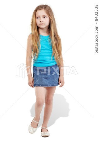 Walking girl poses for camera Walking girl poses for camera 8432338