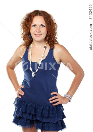 Smiling woman in blue knitted dress 8432433