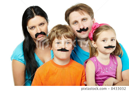 Family of four with glued artificial mustaches. 8433032