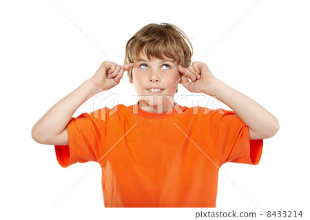 Portrait of smiling boy in orange t-shirt with rolled eyes and f Portrait of smiling boy in orange t-shirt with rolled eyes and f 8433214