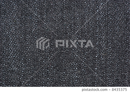Close-up shot of black denim Close-up shot of black denim 8435375