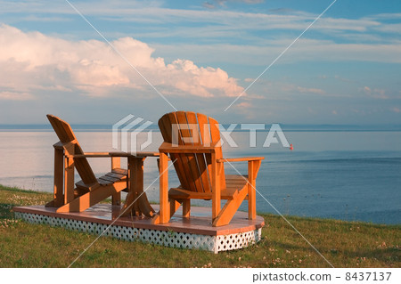 Two Lonely Chairs on the beach in Canada Two Lonely Chairs on the beach in Canada 8437137