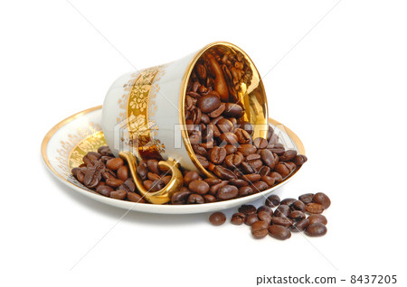 Cup with coffee beans Cup with coffee beans 8437205