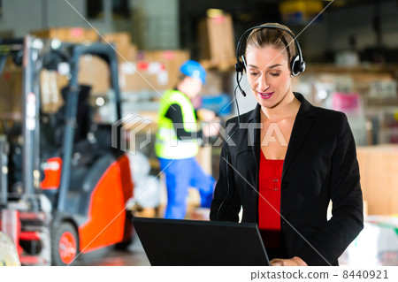 dispatcher using headset at warehouse of forwarding dispatcher using headset at warehouse of forwarding 8440921