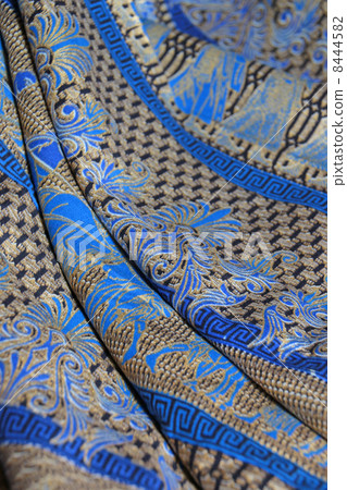 蠟染民間工藝品巴厘島印尼東南亞亞洲貨物布料棉花棉花印花金色藍色紀念品圖案異國背景背景紡織紡織傳統部落馬來西亞傳統 8444582