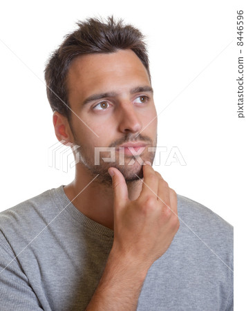 Latin man touching his head Latin man touching his head 8446596