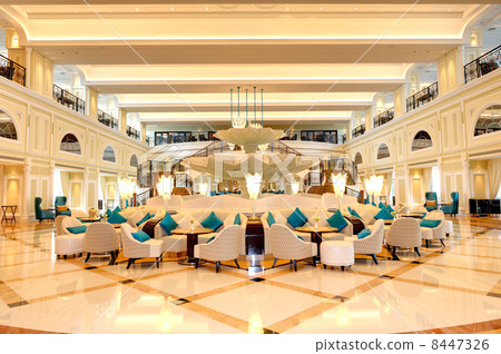 Lobby interior of the luxury hotel in night illumination, Ras Al 8447326