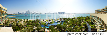 The panorama of beach at modern luxury hotel on Palm Jumeirah ma The panorama of beach at modern luxury hotel on Palm Jumeirah ma 8447345