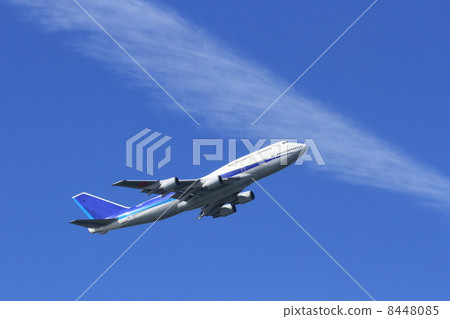 Jumbo jet aircraft and clouds Jumbo jet aircraft and clouds 8448085