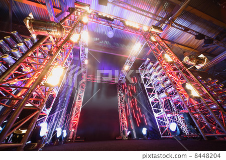 Illuminated way to boxing ring inside fight club; multi-colored 8448204