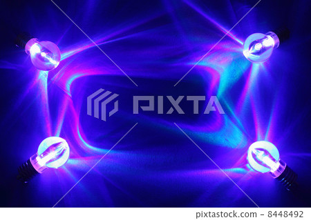 Four lamps illuminated brightly on deep blue background; rectang Four lamps illuminated brightly on deep blue background; rectang 8448492