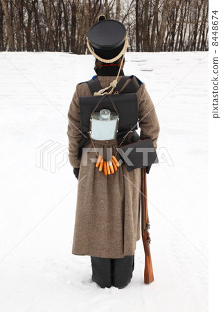 MOSCOW - FEBRUARY 27: Back of soldier with gun at historical rec MOSCOW - FEBRUARY 27: Back of soldier with gun at historical rec 8448674