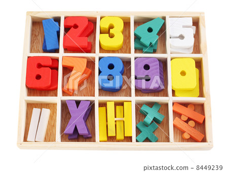 Colorful wooden numbers in box isolated on white background. 8449239
