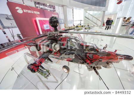 MOSCOW - MAY 21: Miniature helicopter mi-28ne on exhibition at International exhibition of helicopter industry of Helirussia in Exhibition center Expo Crocus, on May 21, 2011 in Moscow, Russia 8449332