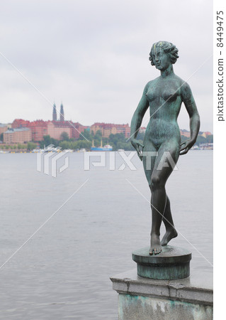 Statue at embankment near the City Hall in Stockholm, Sweden Statue at embankment near the City Hall in Stockholm, Sweden 8449475