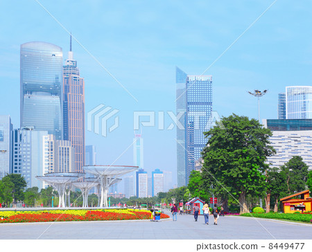 People walk on Haixinsha island on in Guangzhou, China. People walk on Haixinsha island on in Guangzhou, China. 8449477