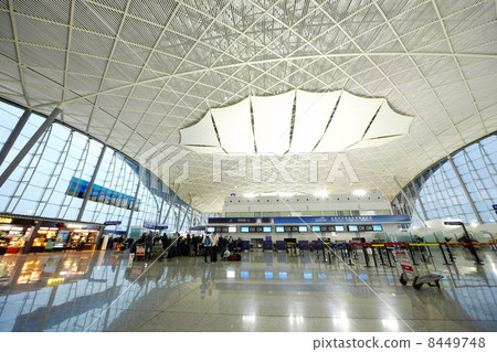 GUANGZHOU - NOV 28: Passengers in Guangzhou Airport (Baiyun), No GUANGZHOU - NOV 28: Passengers in Guangzhou Airport (Baiyun), No 8449748