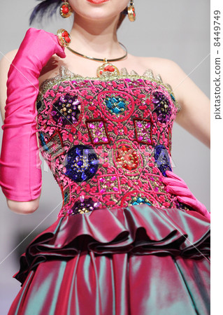 MOSCOW - NOVEMBER 4: Waist of spotted pink dress on show of desi MOSCOW - NOVEMBER 4: Waist of spotted pink dress on show of desi 8449749