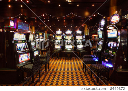NORTH SEA - JULE 23: Lot of slot machines at liner Costa Luminos 8449872