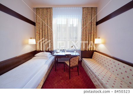 Hotel room with two bed, chair, table, lights, lamp, window Hotel room with two bed, chair, table, lights, lamp, window 8450323