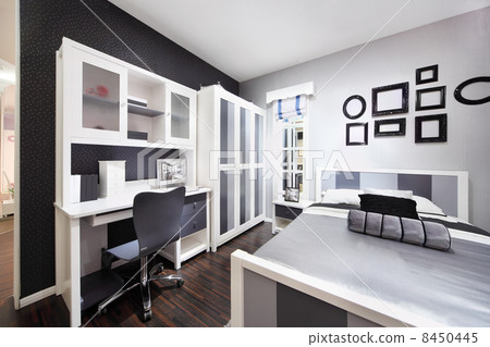 Stylish black-white bedroom with double bed, wardrobe and comput Stylish black-white bedroom with double bed, wardrobe and comput 8450445