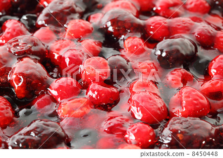 Dessert of different types of red berries in jelly. Close-up. Dessert of different types of red berries in jelly. Close-up. 8450448
