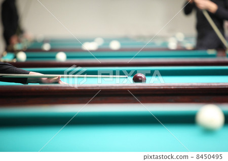 People play in pool in billiard club, focus on ball, hand People play in pool in billiard club, focus on ball, hand 8450495