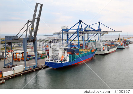 Three big cargo ships in Copenhagen seaport, Denmark; Cranes loa 8450567