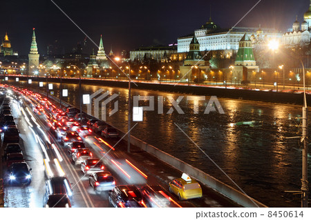 Moscow Kremlin, Moskva River and cars on road. Night cityscape. Moscow Kremlin, Moskva River and cars on road. Night cityscape. 8450614