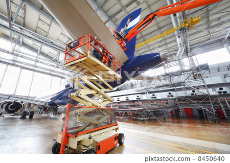 MOSCOW - SEP 22: Repair of Aeroflot aircraft in hangar of Sherem MOSCOW - SEP 22: Repair of Aeroflot aircraft in hangar of Sherem 8450640