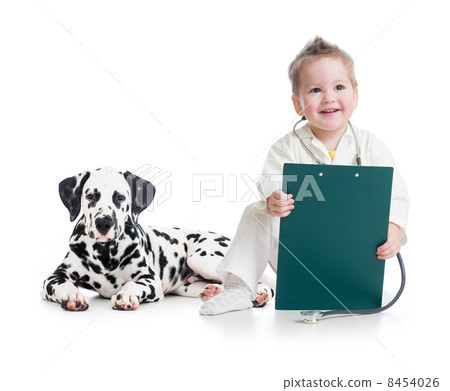 kid playing doctor with dog isolated on white 8454026