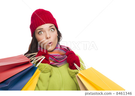 Mixed Race Woman Wearing Hat and Gloves Holding Shopping Bags Mixed Race Woman Wearing Hat and Gloves Holding Shopping Bags 8461346