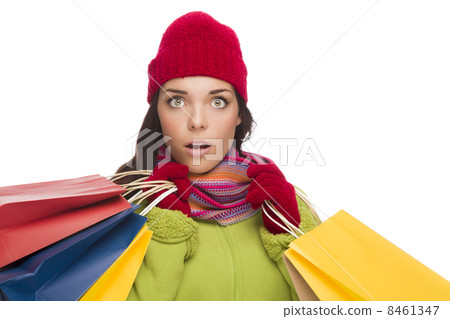 Mixed Race Woman Wearing Hat and Gloves Holding Shopping Bags Mixed Race Woman Wearing Hat and Gloves Holding Shopping Bags 8461347