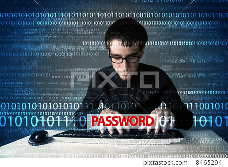 Stock Photo: Young geek hacker stealing password