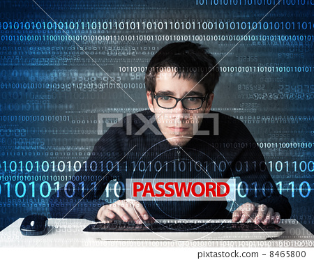 Stock Photo: Young geek hacker stealing password