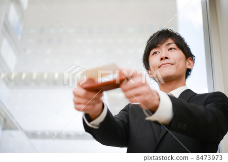 Business scene of a male employee 8473973