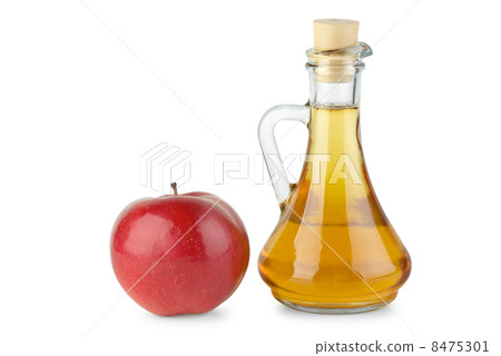 Decanter with apple vinegar and red apple 8475301