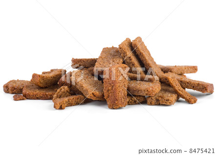 Small pile of rye bread crusts Small pile of rye bread crusts 8475421