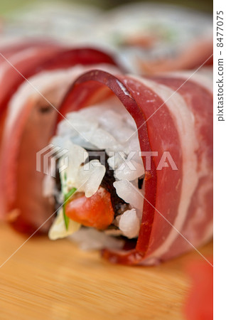 Sushi roll with bacon 8477075