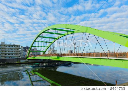 Oda bridge over Sumida River, oil tanker and roll mound Oda bridge over Sumida River, oil tanker and roll mound 8494733