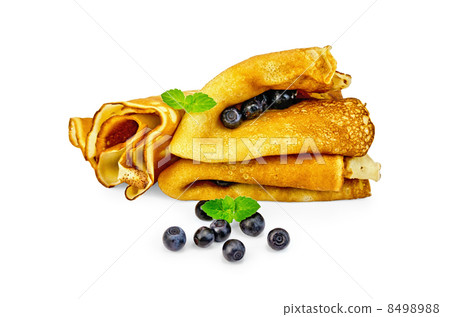 Pancakes with blueberries and mint Pancakes with blueberries and mint 8498988