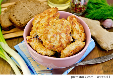 Fritters chicken with bread on the board 8499011