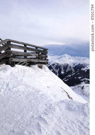 Wooden terrace at mountain ski resort in Alps, Austria 8501794