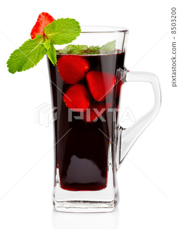 Glass of hot fruit tea with fresh mint and strawberry isolated 8503200
