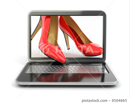E-commerce. High heel shoes on laptop. E-commerce. High heel shoes on laptop. 8504665