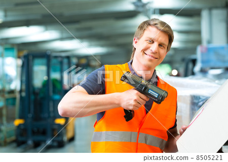 worker scans package in warehouse of forwarding worker scans package in warehouse of forwarding 8505221