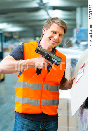 worker scans package in warehouse of forwarding worker scans package in warehouse of forwarding 8505222