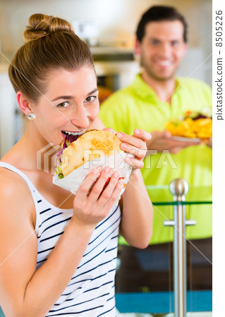 Kebab - customer and hot Doner with fresh ingredients 8505226