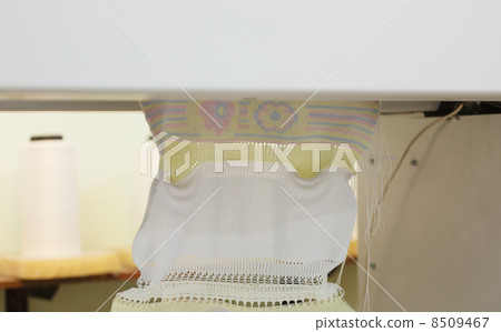 Image from baby's clothing in process of knitting 8509467